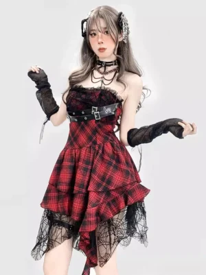 Red and black plaid gothic lolita corset JSK dress front three-quarter view on model with fishnet gloves and gothic jewelry