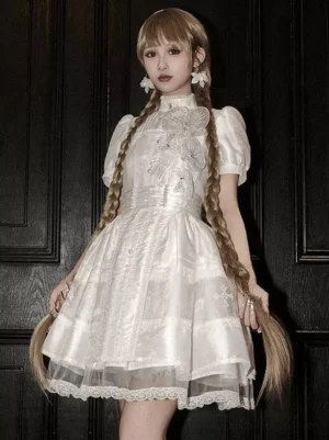 white gothic lolita cross embroidered short sleeve dress full body front view with puffed sleeves lace hem and stand collar