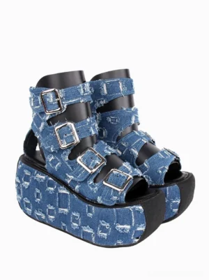 Gothic Lolita platform denim sandals side angle view displaying multi-buckle ankle straps distressed denim texture and black trimmed sole edge detail
