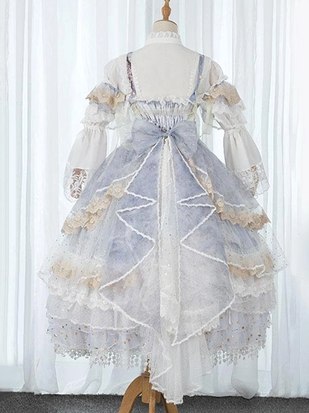 Rear back view of Gothic Lolita dress on BJD doll displaying large decorative back bow sheer lace sleeves and layered ruffles