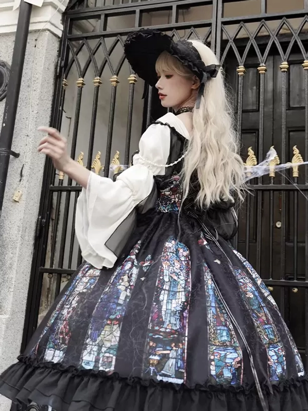 Gothic Lolita dress back three-quarter view showing flared bell sleeves black white color block stained glass full skirt