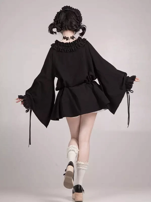 Back view of Gothic Lolita two-piece black dress set showing gathered waist, drawstring sleeve details, and maid-style silhouette on model