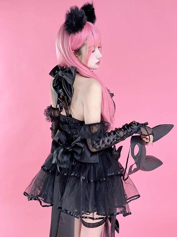 Black gothic lolita dress back three-quarter view layered tulle leg garter