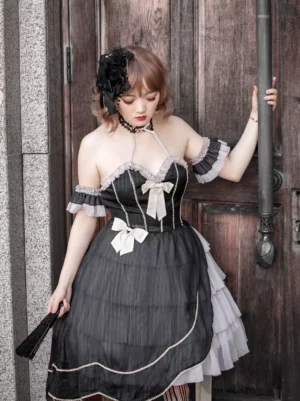 Gothic lolita dress black color front full-body view female model wooden door background off-shoulder ruffled cuffs halter neck bow decorations