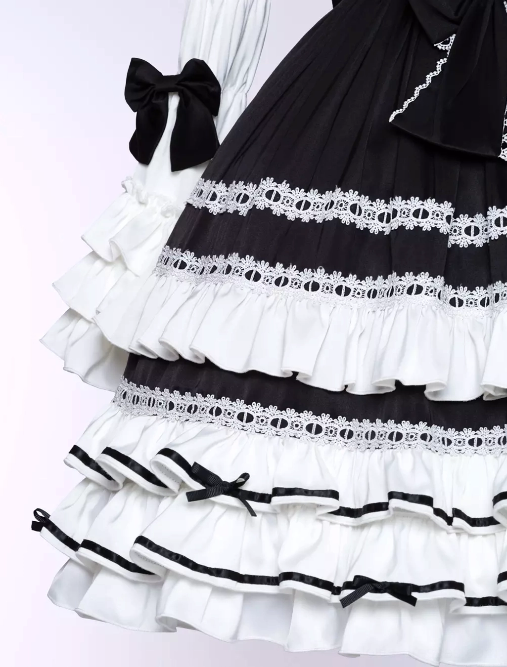 Black gothic lolita dress overall silhouette highlighting multi-layered construction, long sleeves with ruffles, and timeless classic lolita aesthetic