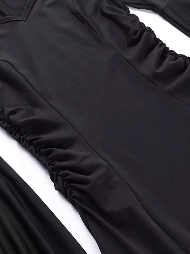 Close-up side waist detail of gothic mermaid dress showing elegant ruched detailing and solid black matte fabric texture