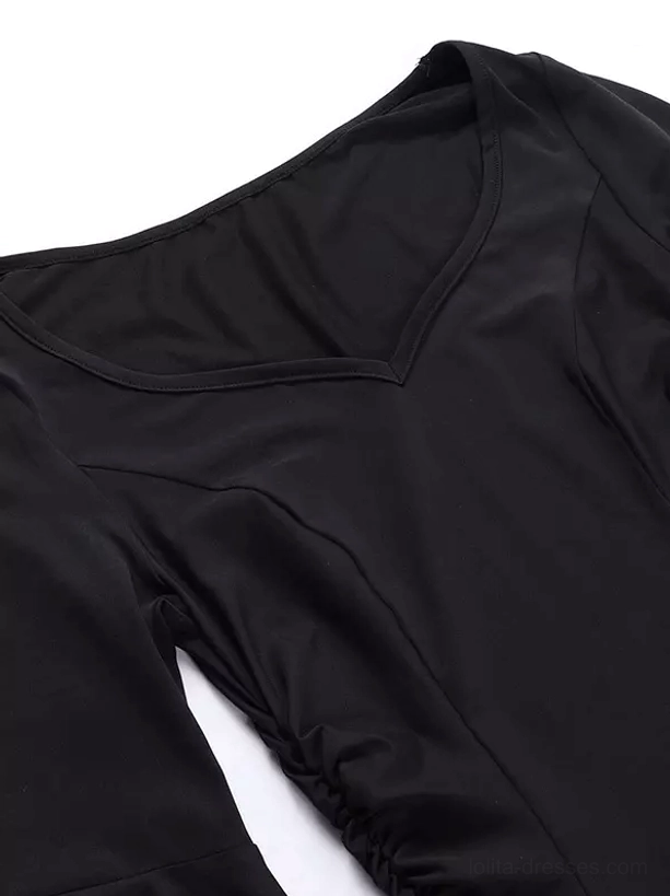 Close-up detail of gothic dress V-neck neckline design in smooth black stretch polyester fabric