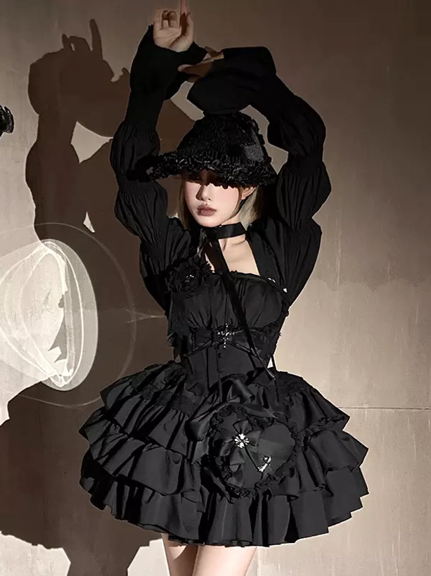 Gothic Lolita aesthetic documentation photo showing dress construction, detachable sleeve mechanism, ruffle layering structure, cross ornament positioning, and coordinate assembly