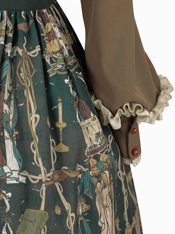 Close-up detail shot dark green gothic lolita dress skirt candle tarot print brown ruffled cuffs red buttons sleeve
