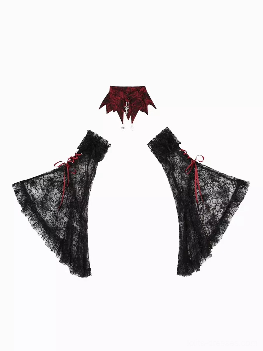 Gothic Lolita dress detail showing burgundy jacquard fabric texture, rose appliqué embellishments, and lace construction highlighting craftsmanship and design sophistication
