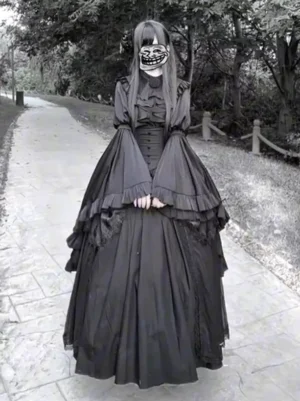Gothic Lolita long dress featuring dramatic layered trumpet sleeves and floor-length ruffled skirt shown from front angle with model wearing mask with clasped hands
