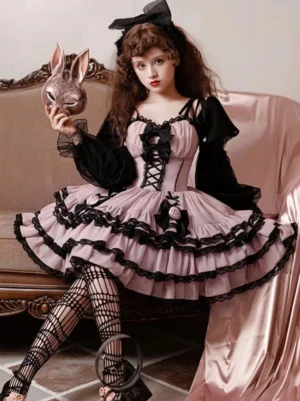 Gothic Lolita dress side front view showing fishnet stockings and layered ruffled skirt design with black lace trim details