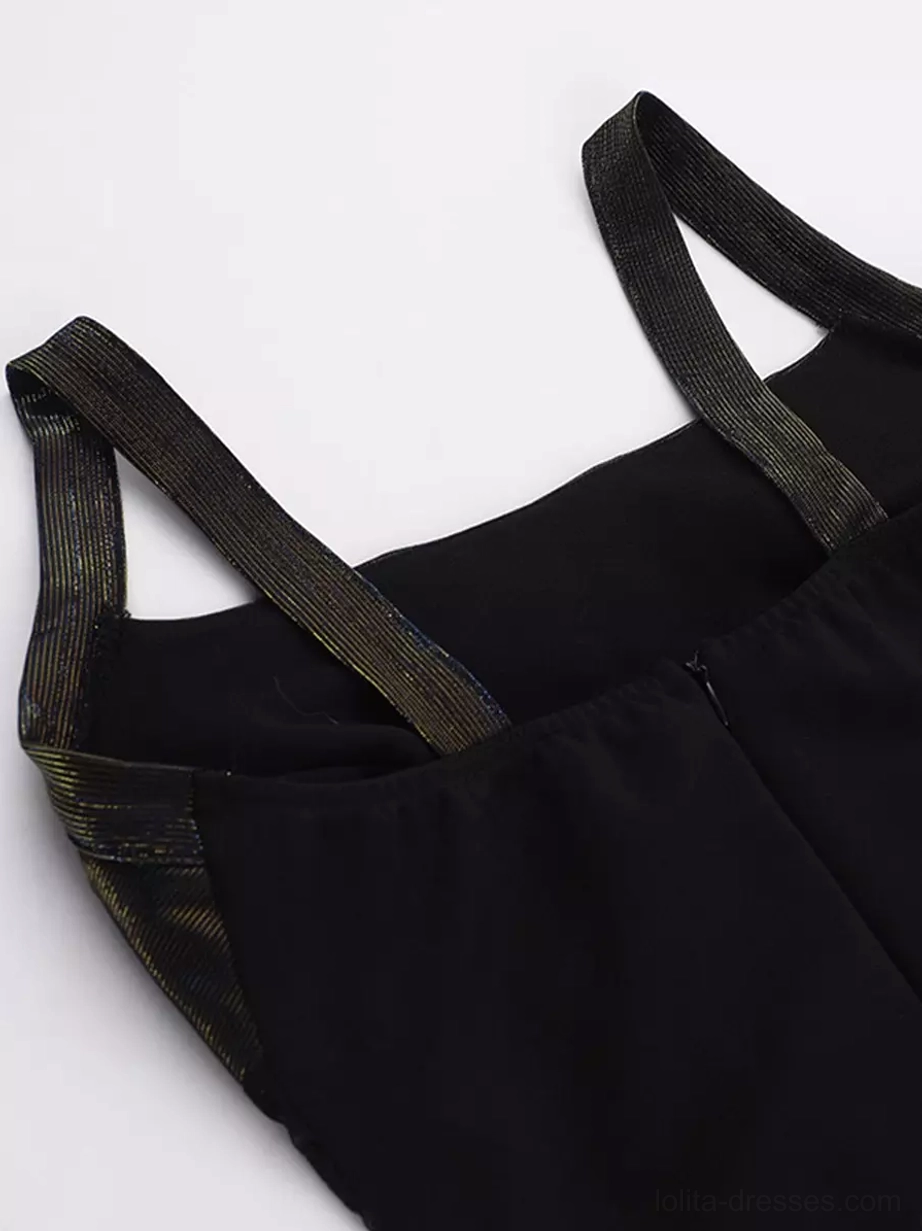 Close-up detail of thin satin dress straps with iridescent edge trim on solid black fabric gothic lolita dress