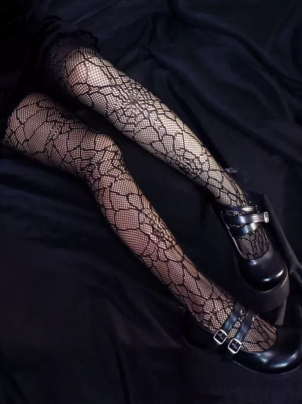 Black patterned fishnet stockings side oblique view with platform mary jane shoes gothic lolita coordinate styling