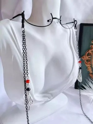 decorative half-frame glasses with chain accessory front view white mannequin bust display black frame link chain hollow silver feather charms