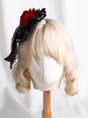 Black lace Gothic Lolita hair accessory with red rose accent and cascading lace veil tails, right front angle display