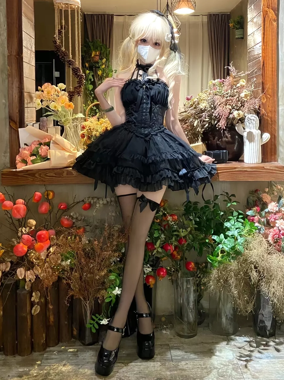 Gothic Lolita halter dress full body front shot blonde model black stockings ruffled layered skirt