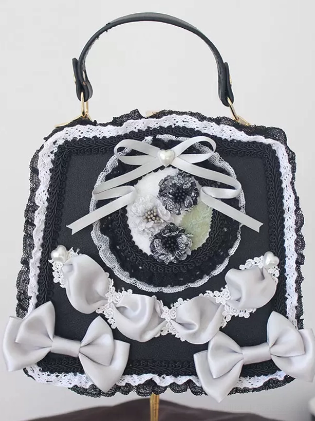 Gothic lolita PU leather handbag black with white satin bows black lace trims monochrome floral embroidery