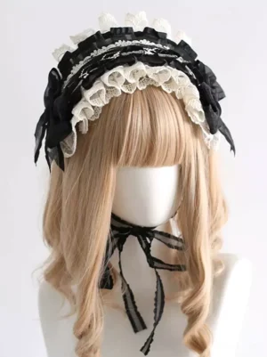 Front close-up view of gothic lolita headband displaying tiered lace construction, multiple black bows, and long adjustable black tie straps for secure fit and styling versatility