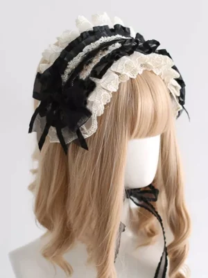 Gothic lolita headband accessory left side profile view multi-layered ribbon trim cream lace edging black bow decorations