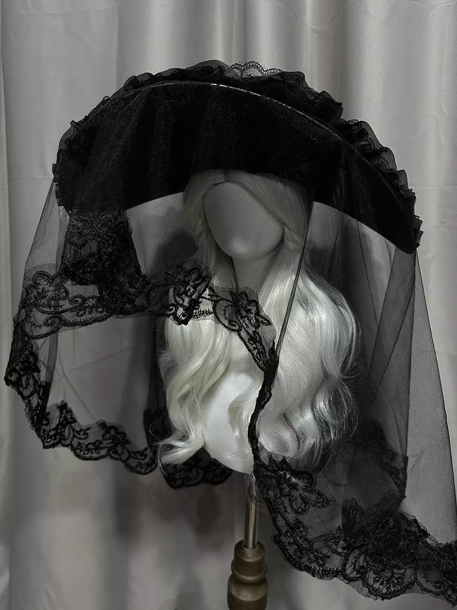 Black gothic lolita headdress with ruffled lace brim and tulle veil, rear three-quarter angle showcasing back construction