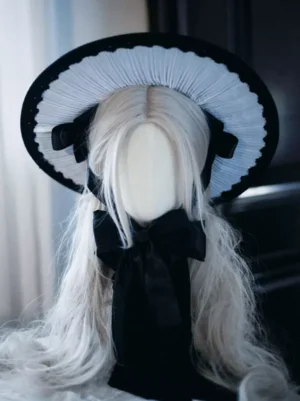 Gothic Lolita headdress three-quarter front view on mannequin with silver curly wig showing long black satin neck bow