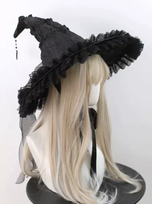 Gothic lolita headdress front three-quarter view with ruffled mesh brim and bat charm