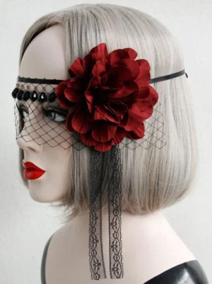 Left side profile of Gothic Lolita flower veil headwear showing beaded trim, dangling lace tassels, black head strap, and wine-red floral element