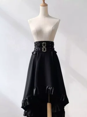 Black gothic lolita high-waist corset midi skirt front view displaying structured metal buckle waistband and asymmetric ruffle hem on white studio background
