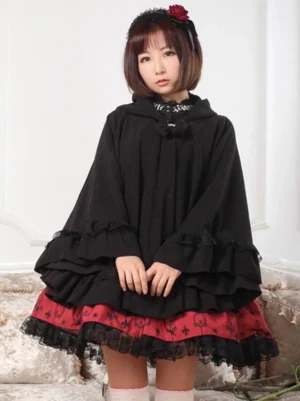 Gothic lolita hooded cape coat double ruffled cuffs with star neck clasp detail shown in medium shot front view