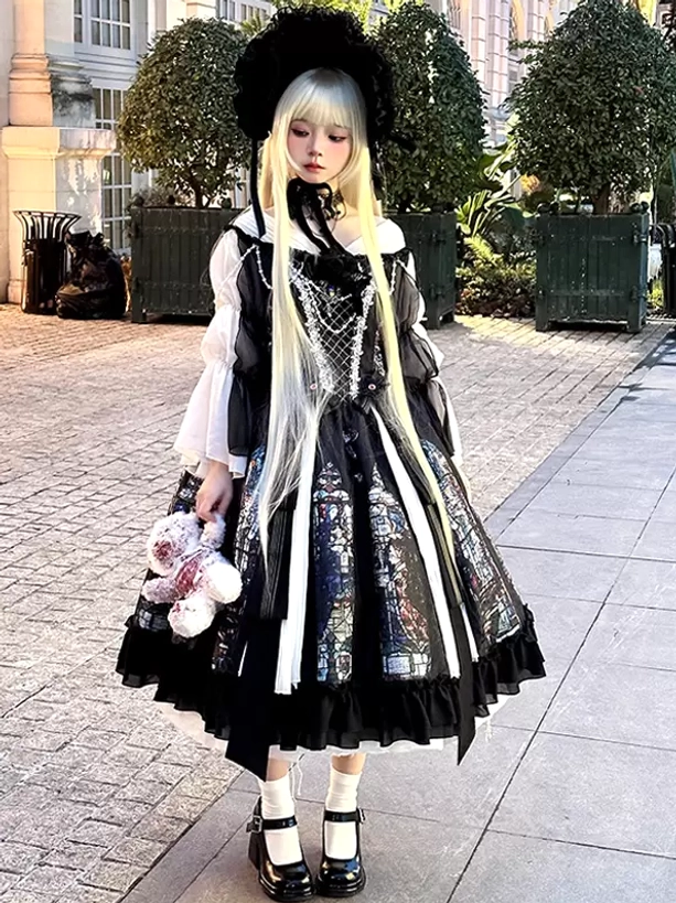 Full length Gothic Lolita black dress with stained glass pattern outdoor setting side view showing dress proportions and silhouette