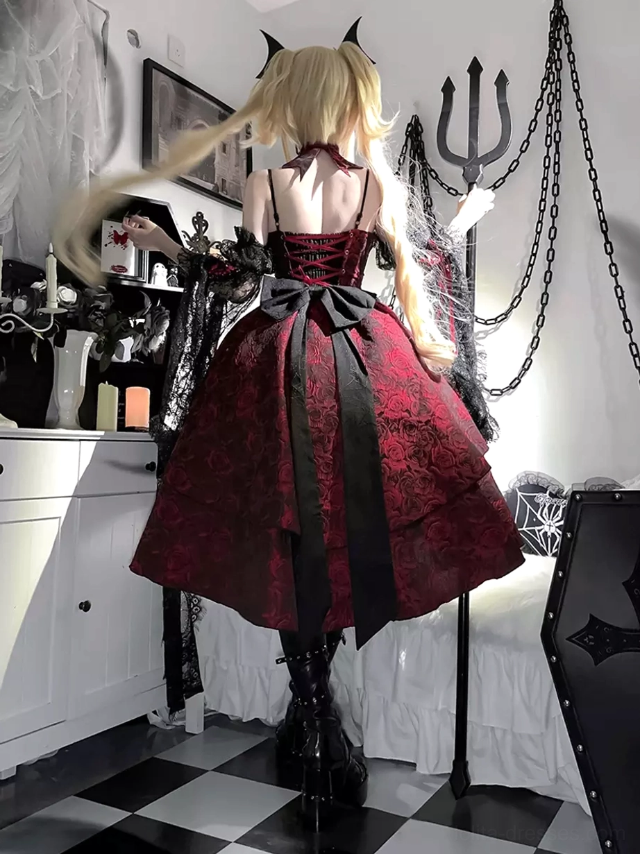 Full back view of burgundy and black Gothic Lolita jumper skirt displaying lace-up back closure and layered tulle under-skirt construction with dramatic bow detail