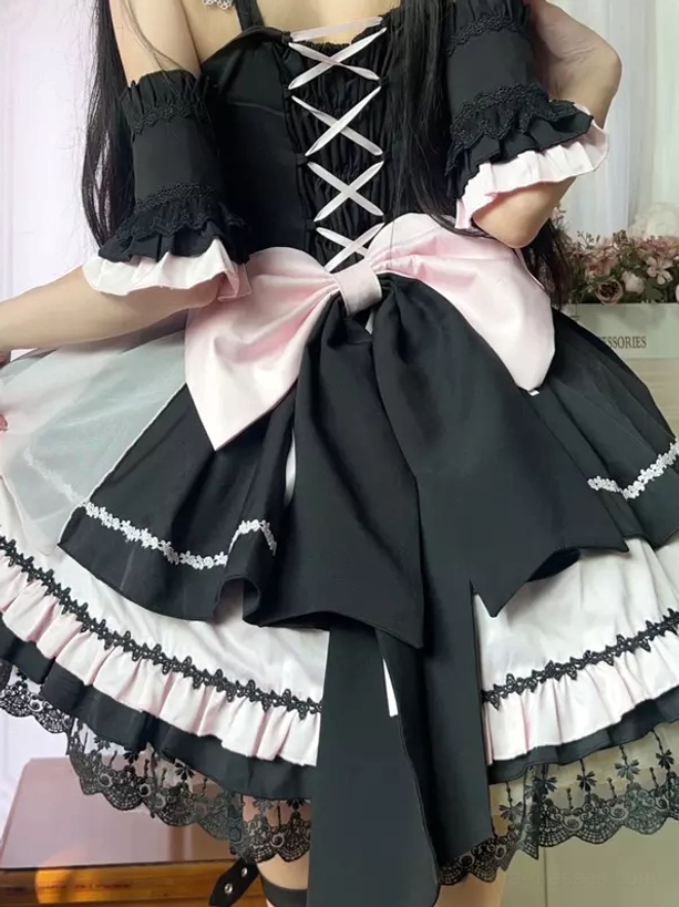 Gothic lolita JSK back three-quarter view large pink bow crisscross lace-up bodice multi-color