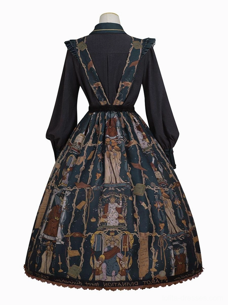 Black Gothic Lolita JSK dress back flat lay display, revealing suspender straps, ruffled trim details, and full tarot print pattern