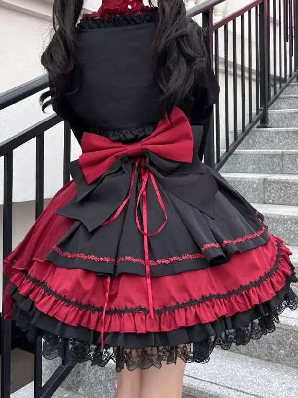 Gothic lolita dress back view large red bow color-block design black pink lace hem ruffles