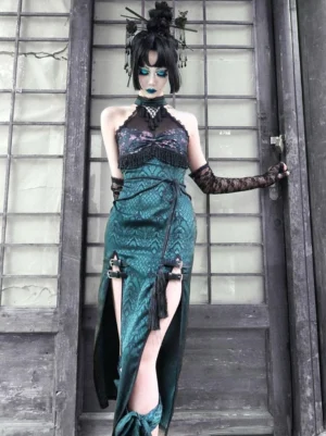 Gothic lolita dress full front view featuring mesh halter neckline, waist tassel decorative detail, beaded fringe on bust, and floral print pattern in dark green
