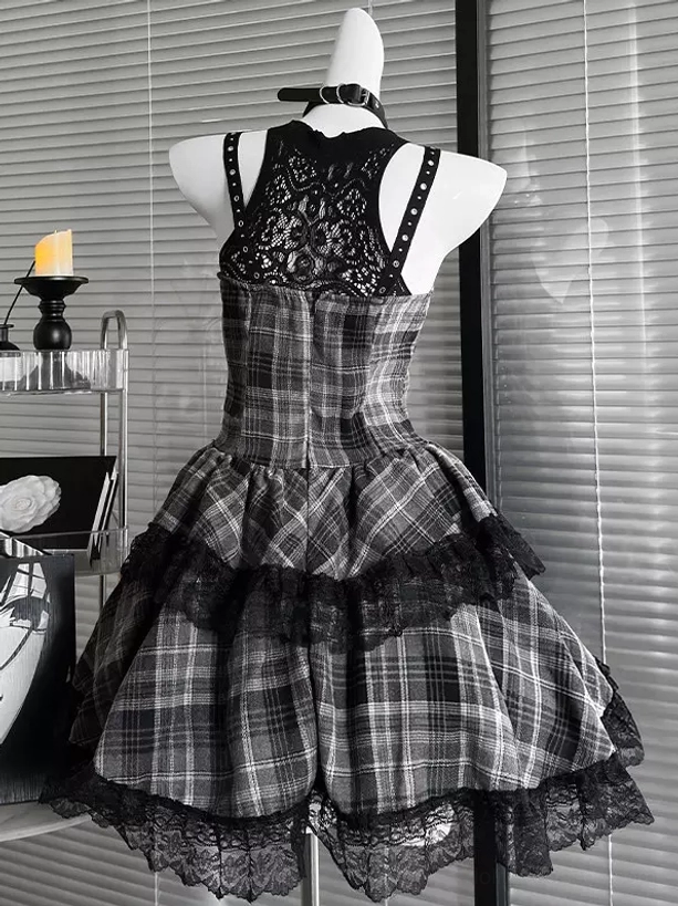 Back view of grey and black plaid gothic lolita JSK dress showing lace panel back, rivet-adorned shoulder straps, attached gothic choker, and ruffled lace hem detail