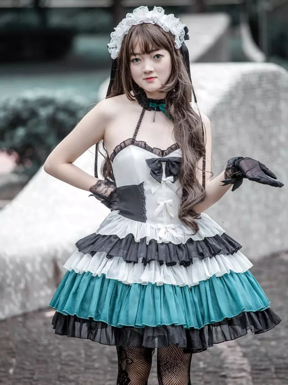 Gothic Lolita JSK sleeveless dress halter neck design front view model hands on hips layered ruffles