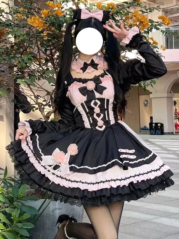 Gothic lolita JSK pink color-block lace corset bodice rose accents three-quarter front pose