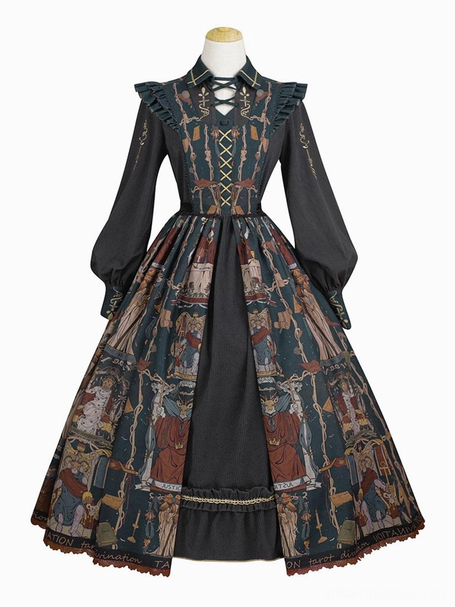 Black Gothic Lolita jumper dress with tarot print and lace-up bodice, front flat lay display showing full skirt volume and ruffled hem details