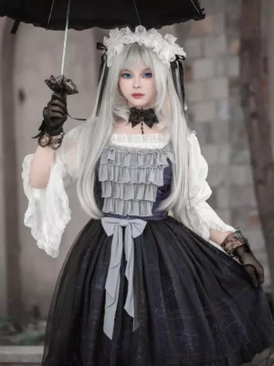 Gothic lolita JSK dress medium front view square neckline grey ruffles vintage stone building backdrop
