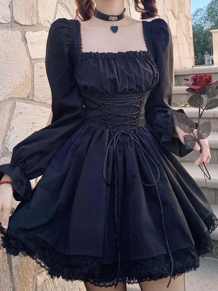 Black gothic lolita corset dress half-body close-up, lace-up waist detail, square neckline, puff sleeves with rose prop - outdoor romantic aesthetic