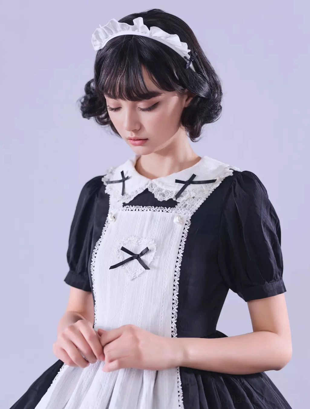 Gothic Lolita maid dress care and maintenance guide visual, proper storage display, fabric care demonstration, preservation techniques