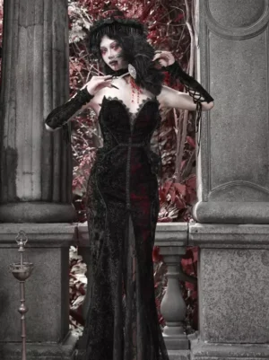 Gothic dark romance lolita dress with mermaid silhouette showing three-quarter view with long lace gloves and front skirt slit detail on vintage stone balcony background