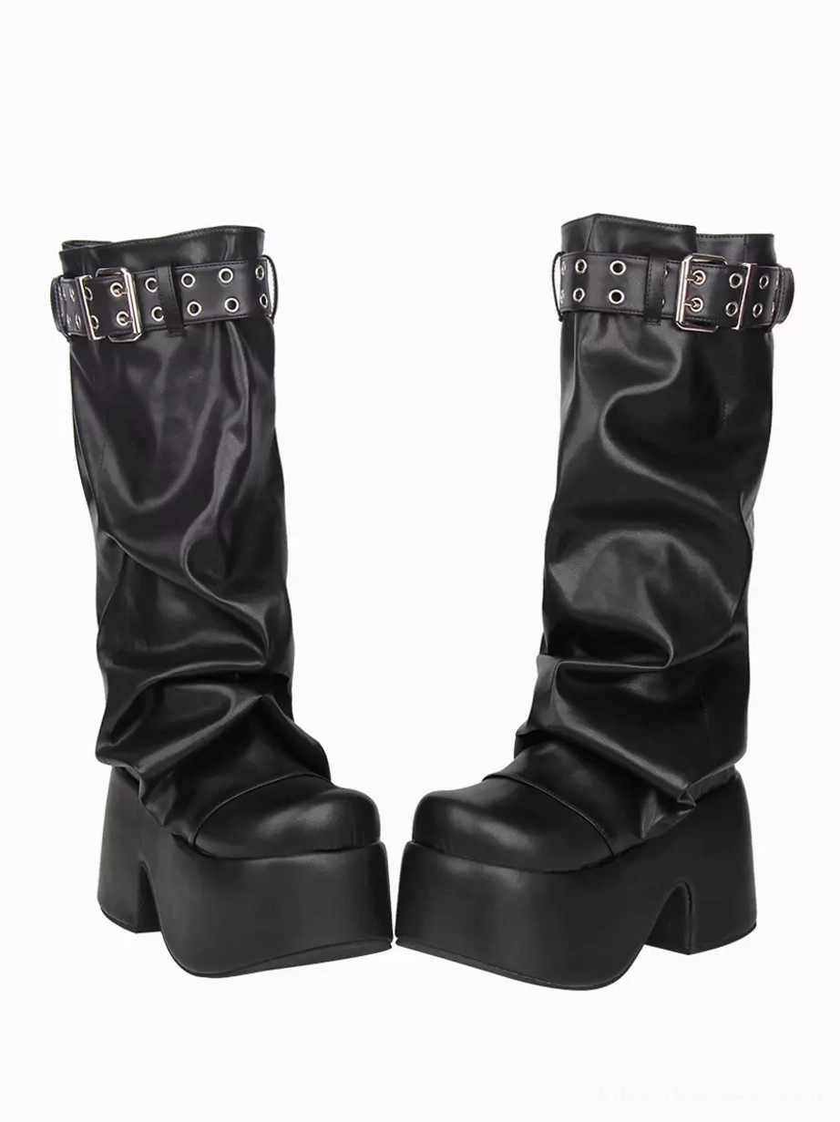 Pair of gothic Lolita mid-calf platform boots black PU leather chunky platform heel low angle front view