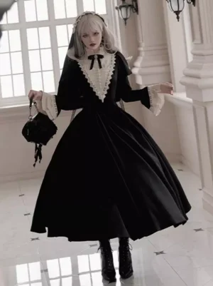Black Gothic Lolita nun dress with bow neck detail, midi flared skirt, short sleeves with lace trim, paired with classic black handbag - three-quarter angle pose