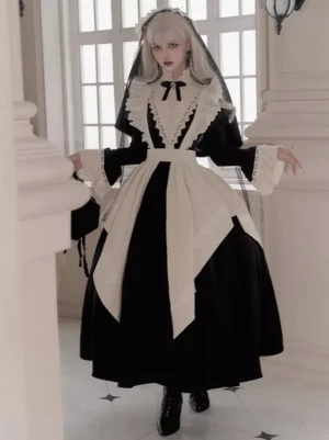 Full body front view of gothic lolita nun style coordinate featuring black and off-white color scheme with lace collar and decorative apron, modeled on silver-haired figure in European retro white corridor setting
