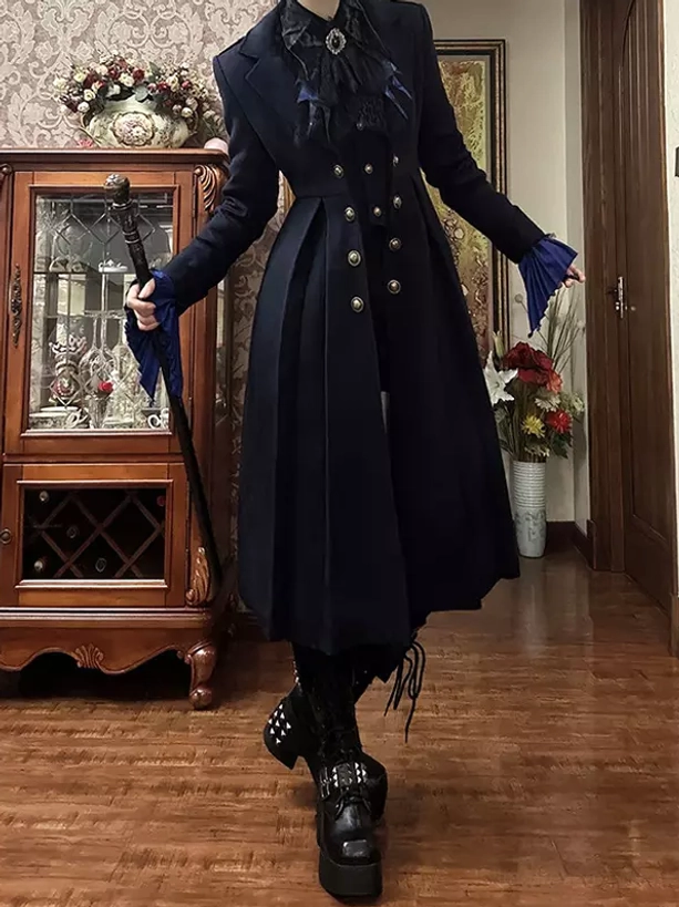 Gothic lolita navy overcoat peaked lapel design blue ruffled cuffs studded platform boots left side view