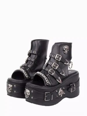 Gothic lolita platform sandals with skull rivets peep toe black PU leather front three-quarter view showing chain and decorative hardware