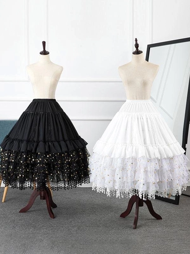 Black and white Lolita petticoat styles comparison showing star tulle hem versus plain lace trim options full-length mirror view